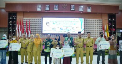 Perkuat Jamsostek,   Pemkot Bagikan BPJS Ketenagakerjaan pada Ketua RT, Lingkungan dan Linmas
